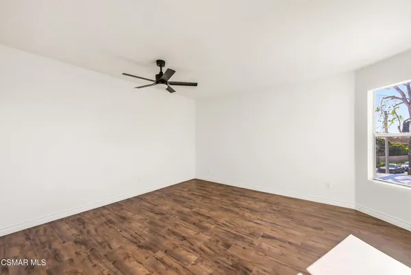a view of a room with a sink and a window