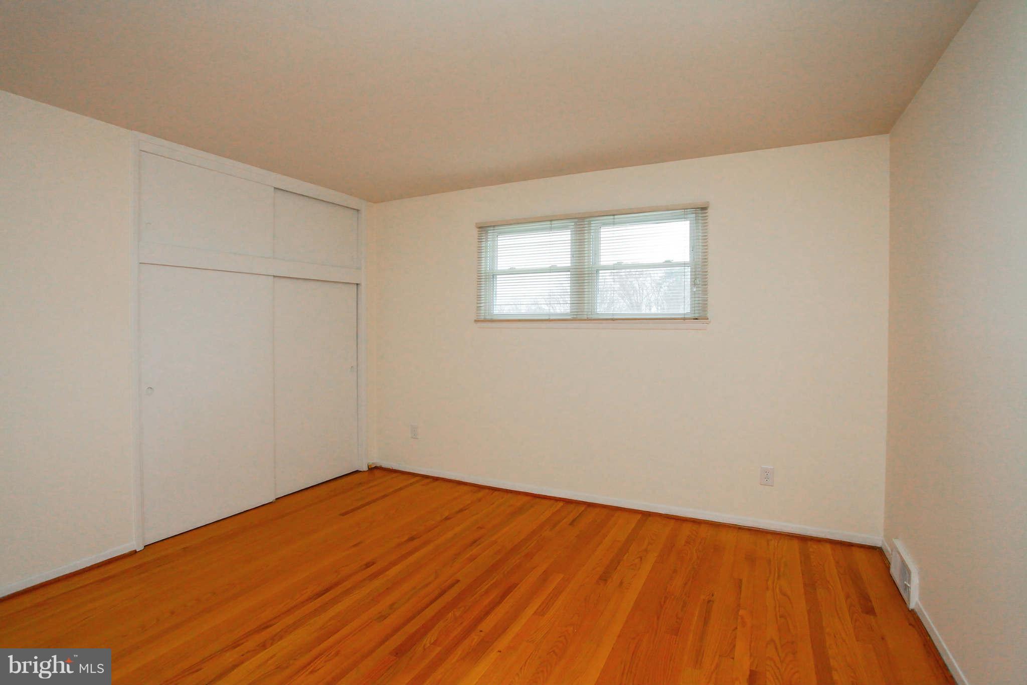 5917 Atteentee Road Springfield, VA 22150 - Photo 12 of 30 a view of empty room with wooden floor