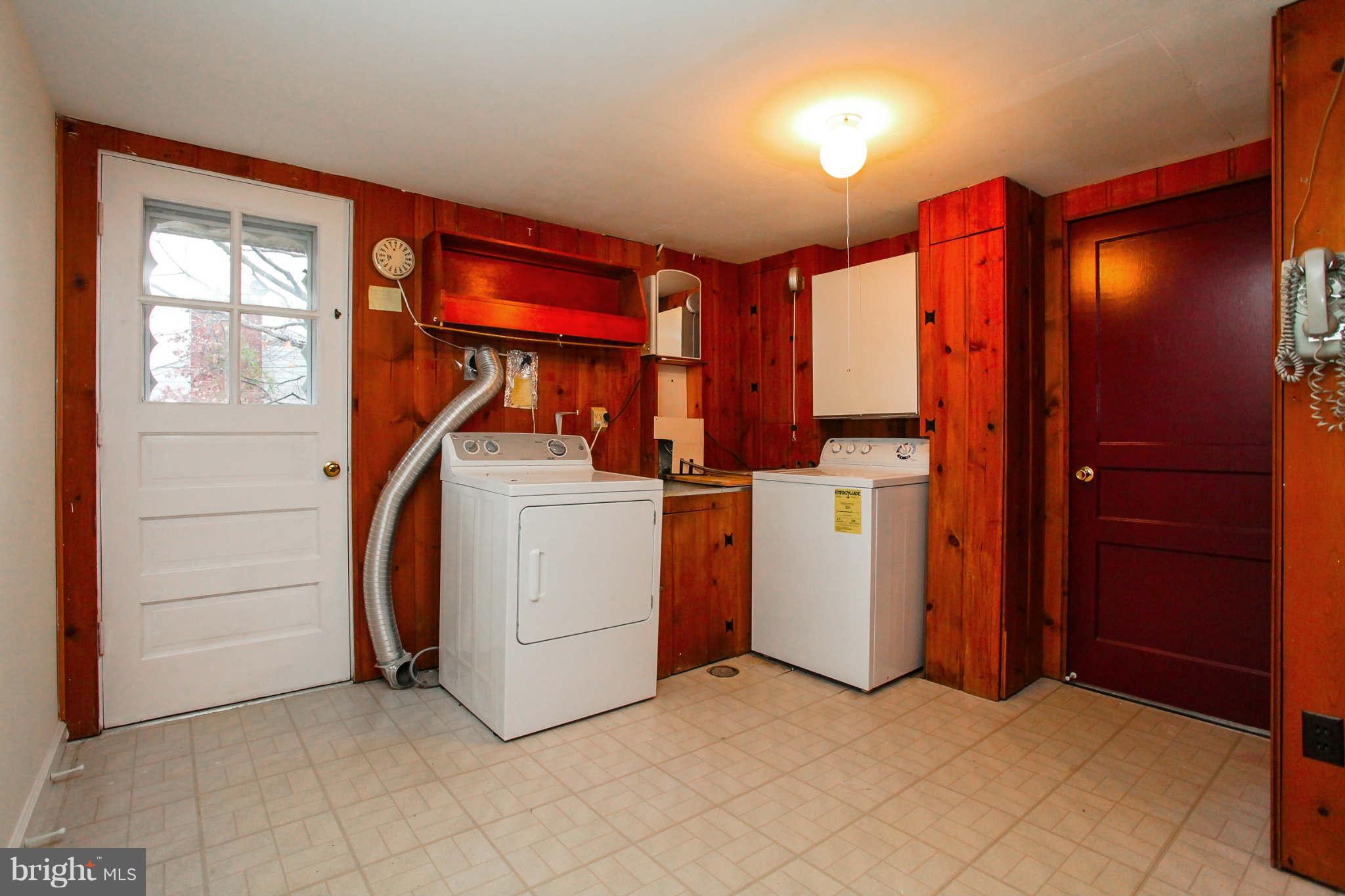 5917 Atteentee Road Springfield, VA 22150 - Photo 25 of 30 a utility room with dryer and washer