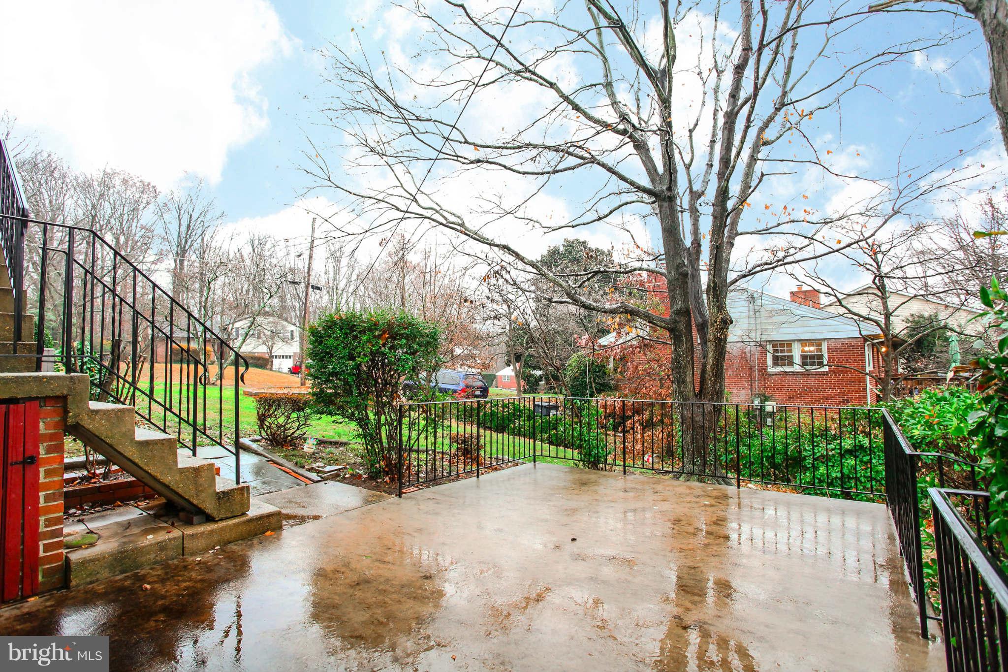5917 Atteentee Road Springfield, VA 22150 - Photo 27 of 30 a pathway of a house with a yard