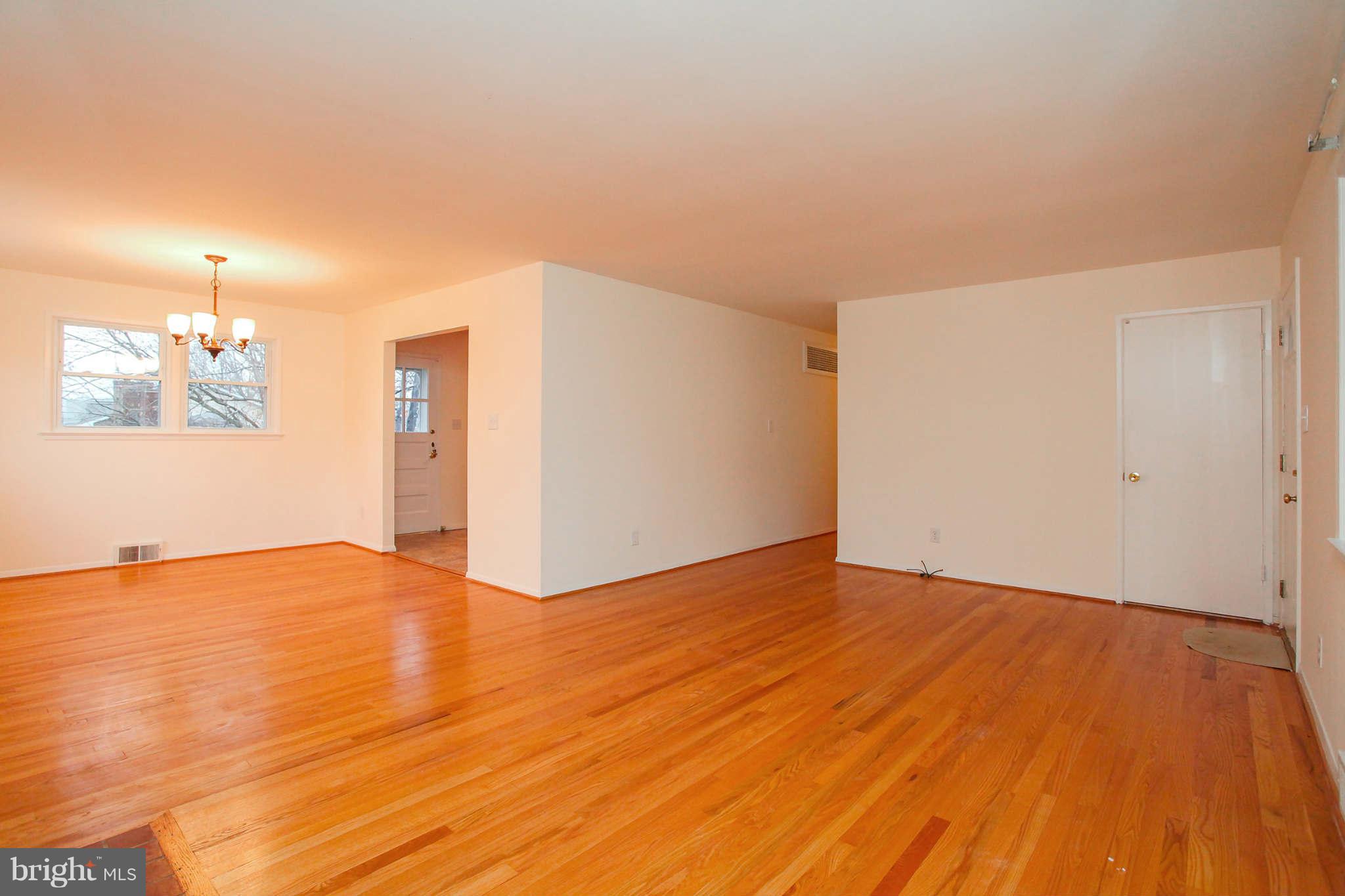 5917 Atteentee Road Springfield, VA 22150 - Photo 6 of 30 a view of empty room with wooden floor