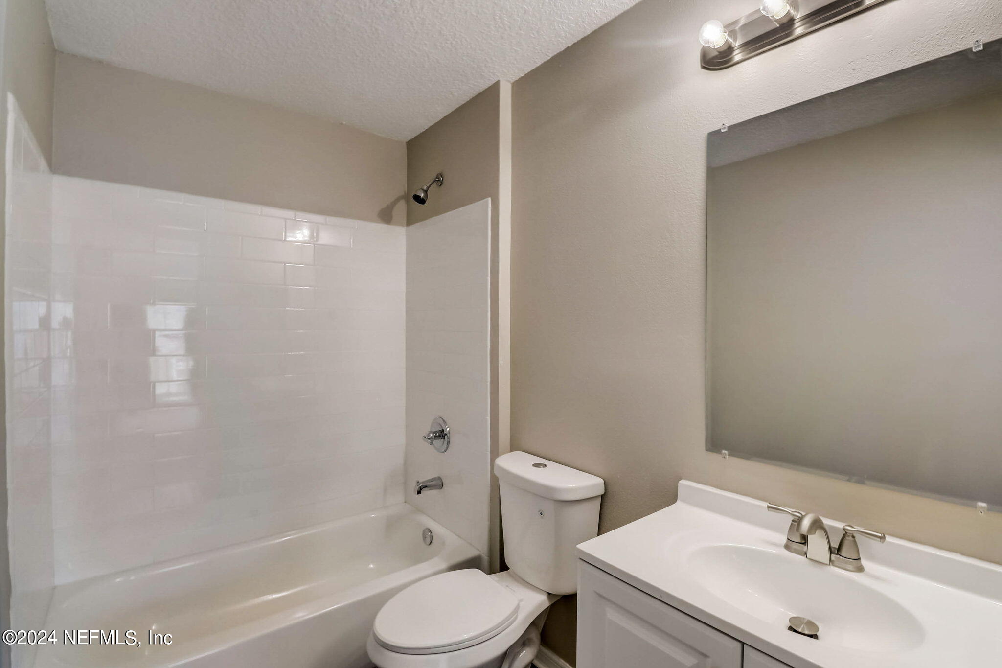 794 Bent Baum Road Jacksonville, FL 32205 - Photo 11 of 13 a bathroom with a sink toilet and shower