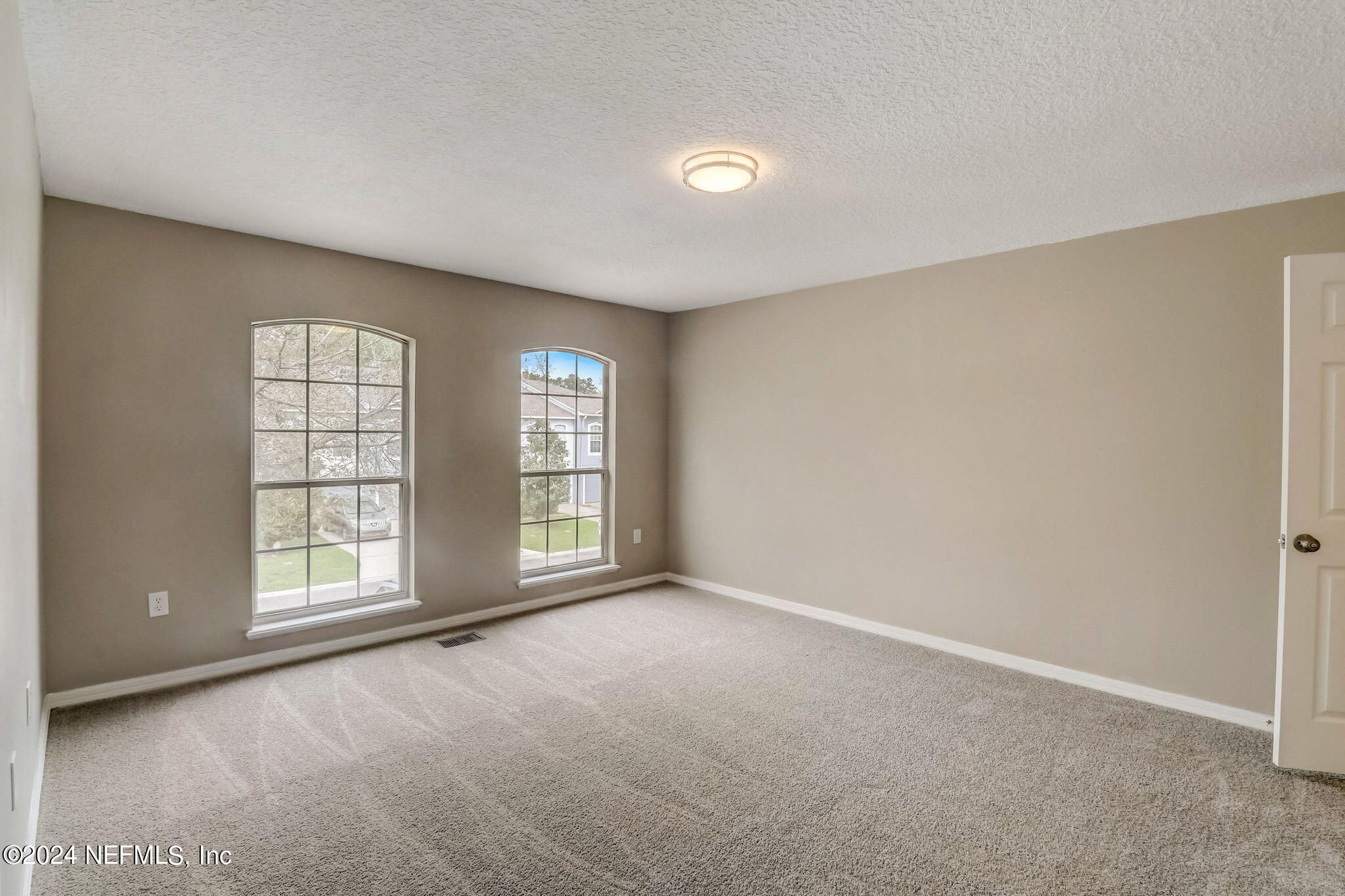 794 Bent Baum Road Jacksonville, FL 32205 - Photo 8 of 13 a view of an empty room with a window