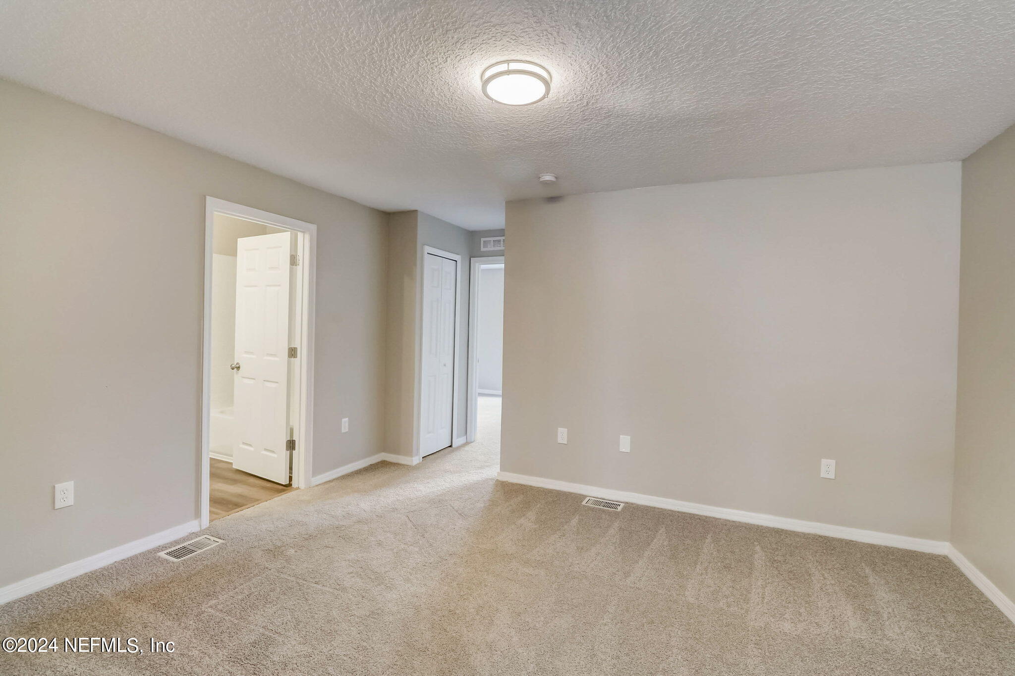794 Bent Baum Road Jacksonville, FL 32205 - Photo 10 of 13 a view of an empty room and a window