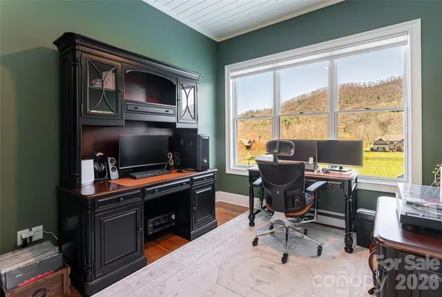 a bedroom with bed and a window