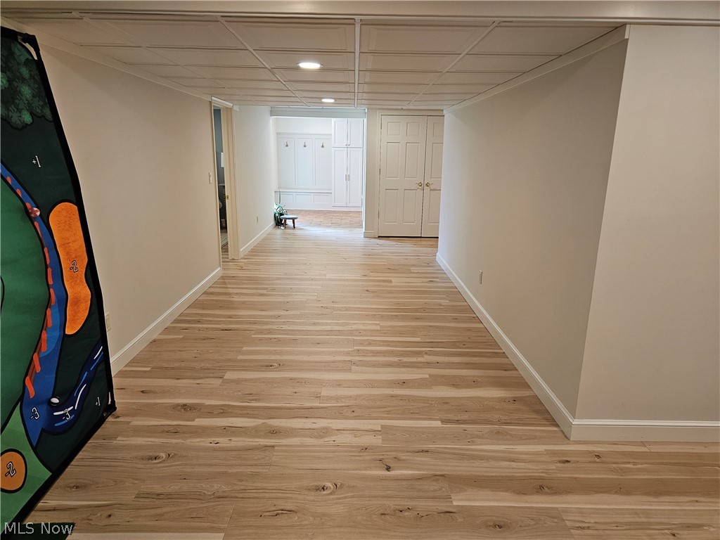 2363 Tabor Ridge Road Northeast New Philadelphia, OH 44663 - Photo 39 of 42 Spacious hallway featuring light wood-finish flooring, recessed lighting, and a neutral color palette