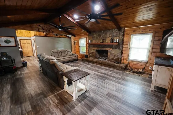 a kitchen with lots of counter top space and stainless steel appliances