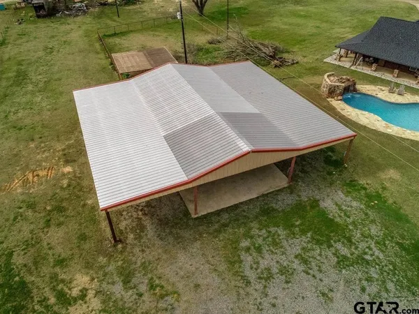 a view of a large body of water with a building in the background