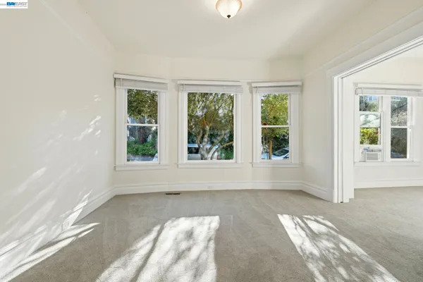 an empty room with windows