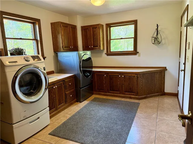 a view of a bathtub and a sink in a room