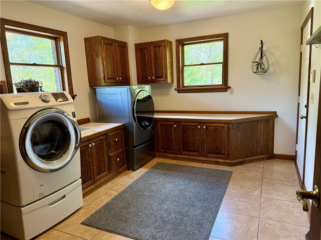 111 McCall Road Butler, PA 16001 - Photo 18 of 50 a view of a bathtub and a sink in a room