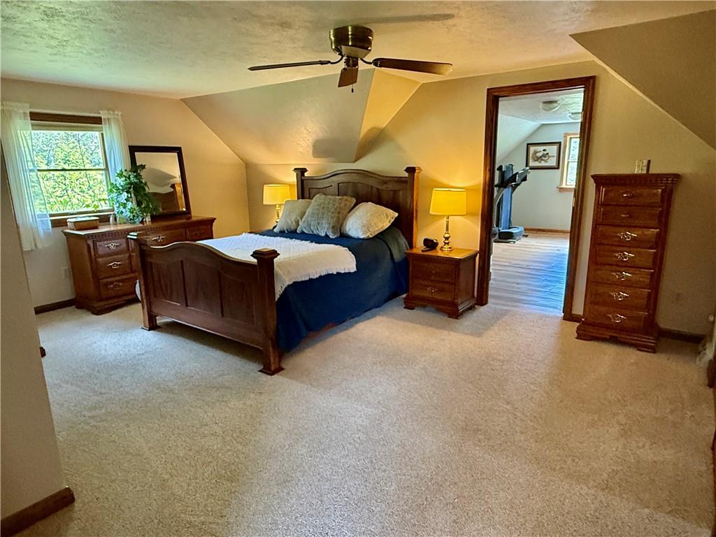 111 McCall Road Butler, PA 16001 - Photo 20 of 50 a bedroom with a bed and a dresser