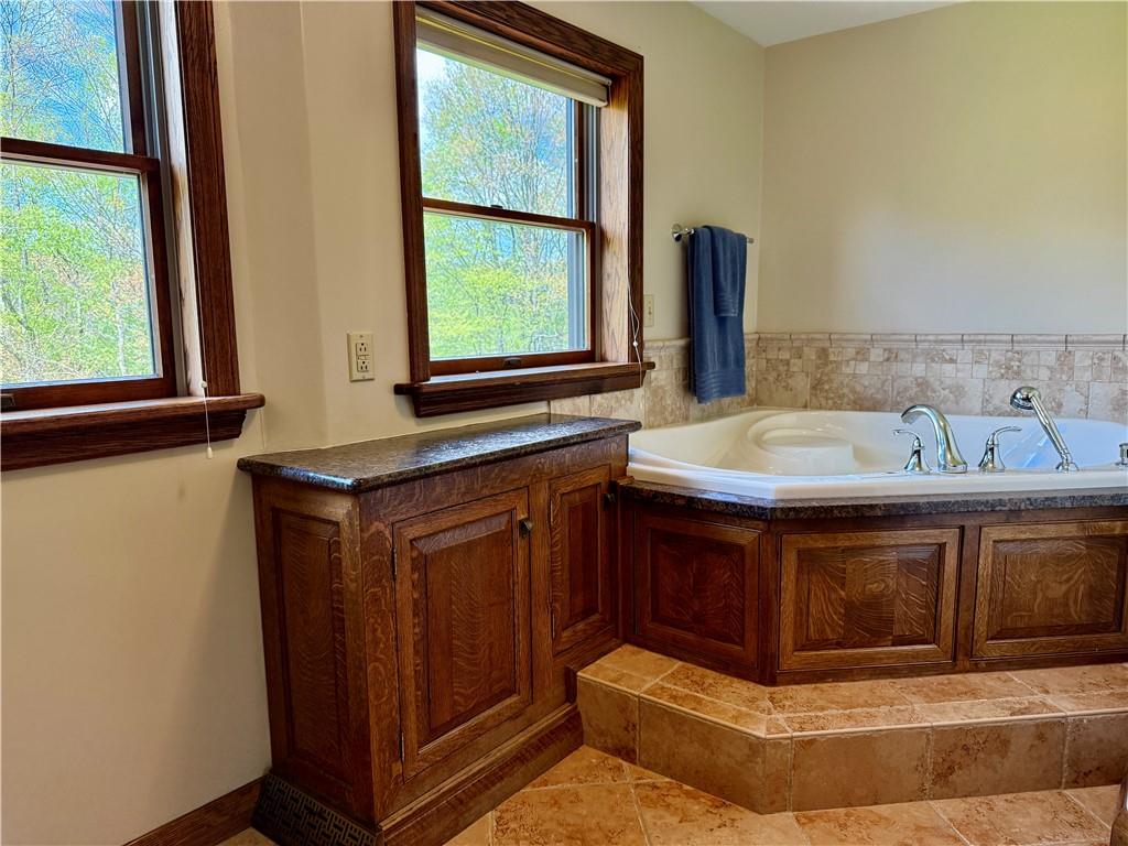 111 McCall Road Butler, PA 16001 - Photo 25 of 50 a bathroom with a sink and a window