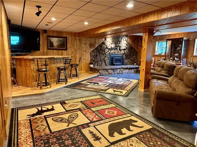a living room with a couch and a flat screen tv