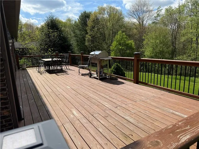 a view of a balcony with chairs