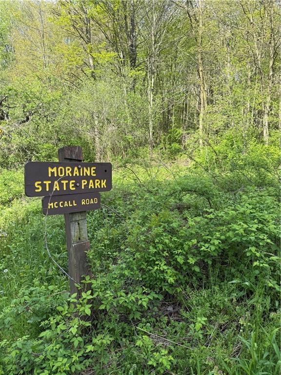 111 McCall Road Butler, PA 16001 - Photo 44 of 50 a sign that is sitting in front of a tree