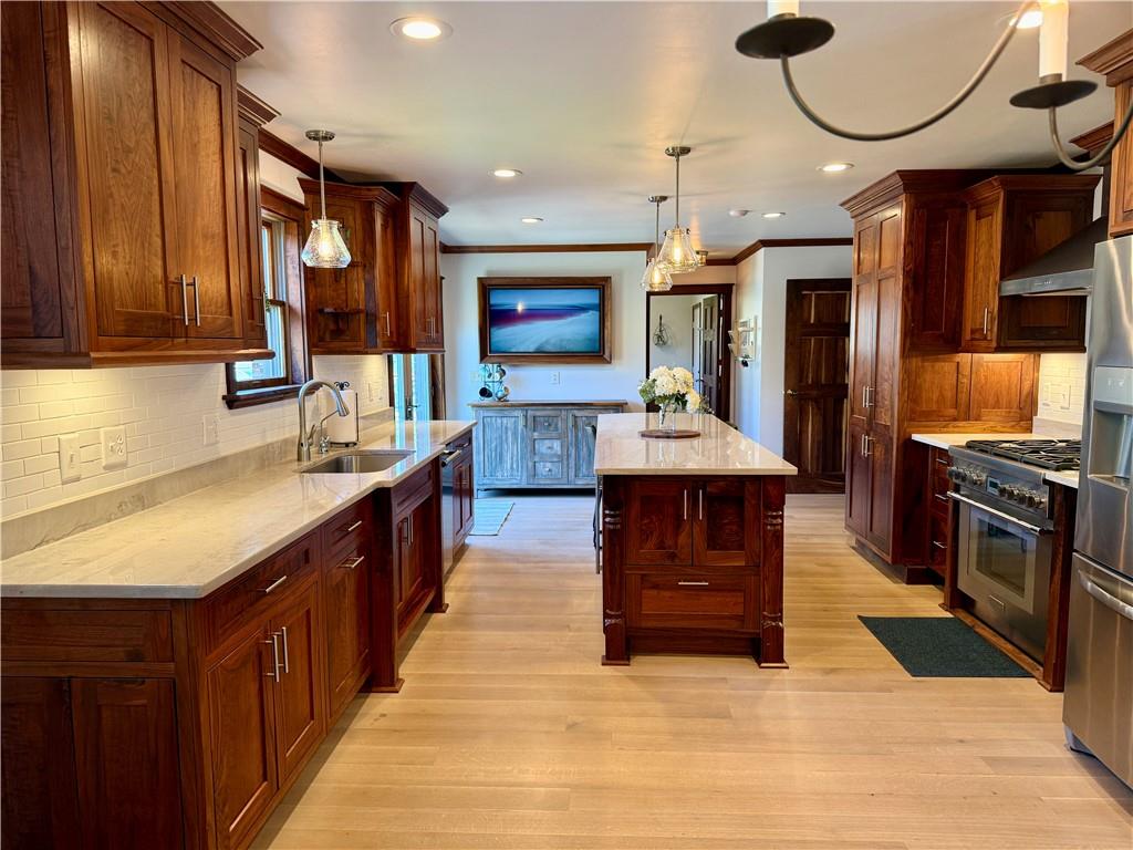 111 McCall Road Butler, PA 16001 - Photo 10 of 50 a kitchen with stainless steel appliances a sink and a stove