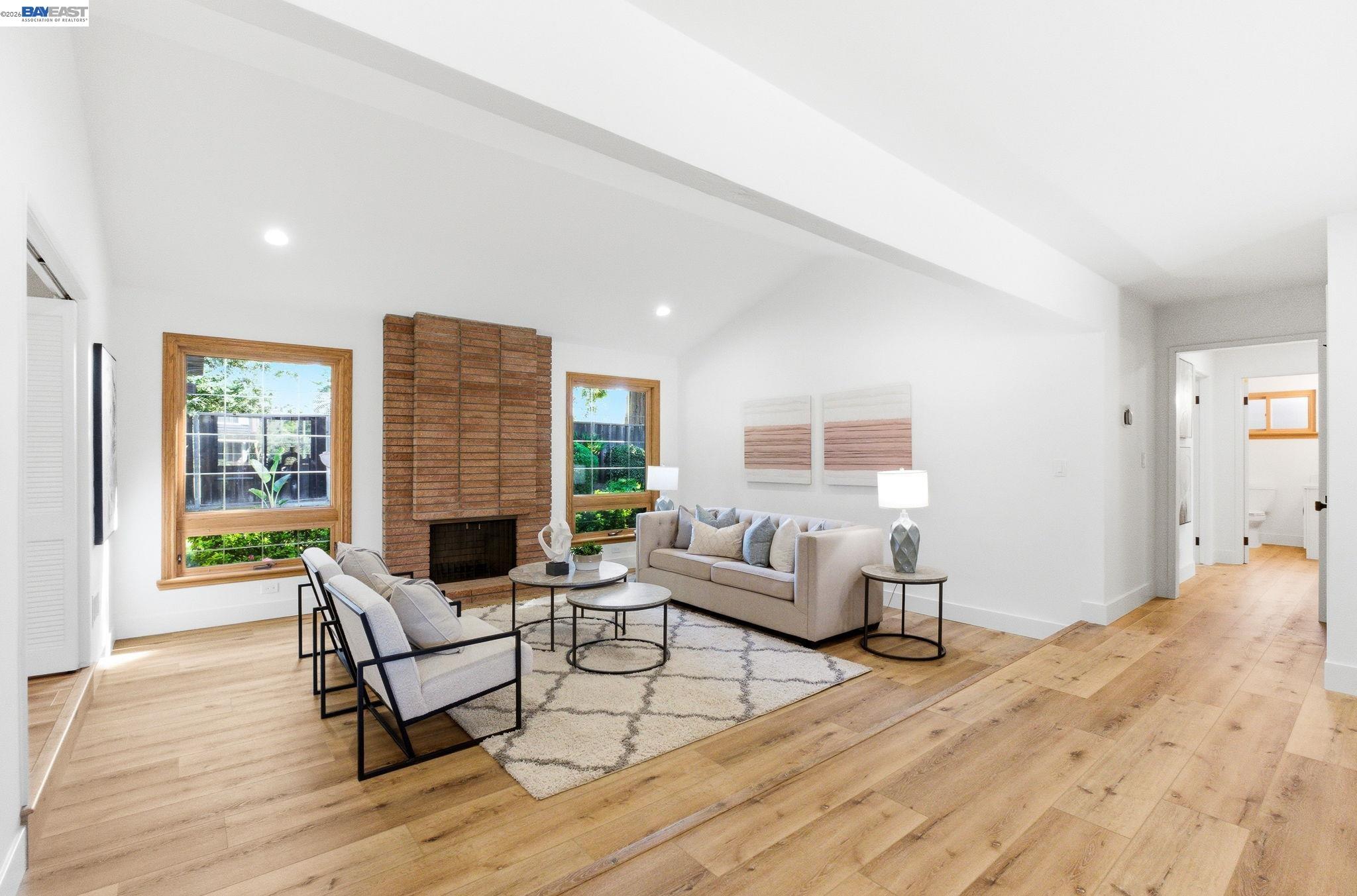 2645 Swanson Way Mountain View, CA 94040 - Photo 12 of 50 a living room with furniture and a wooden floor