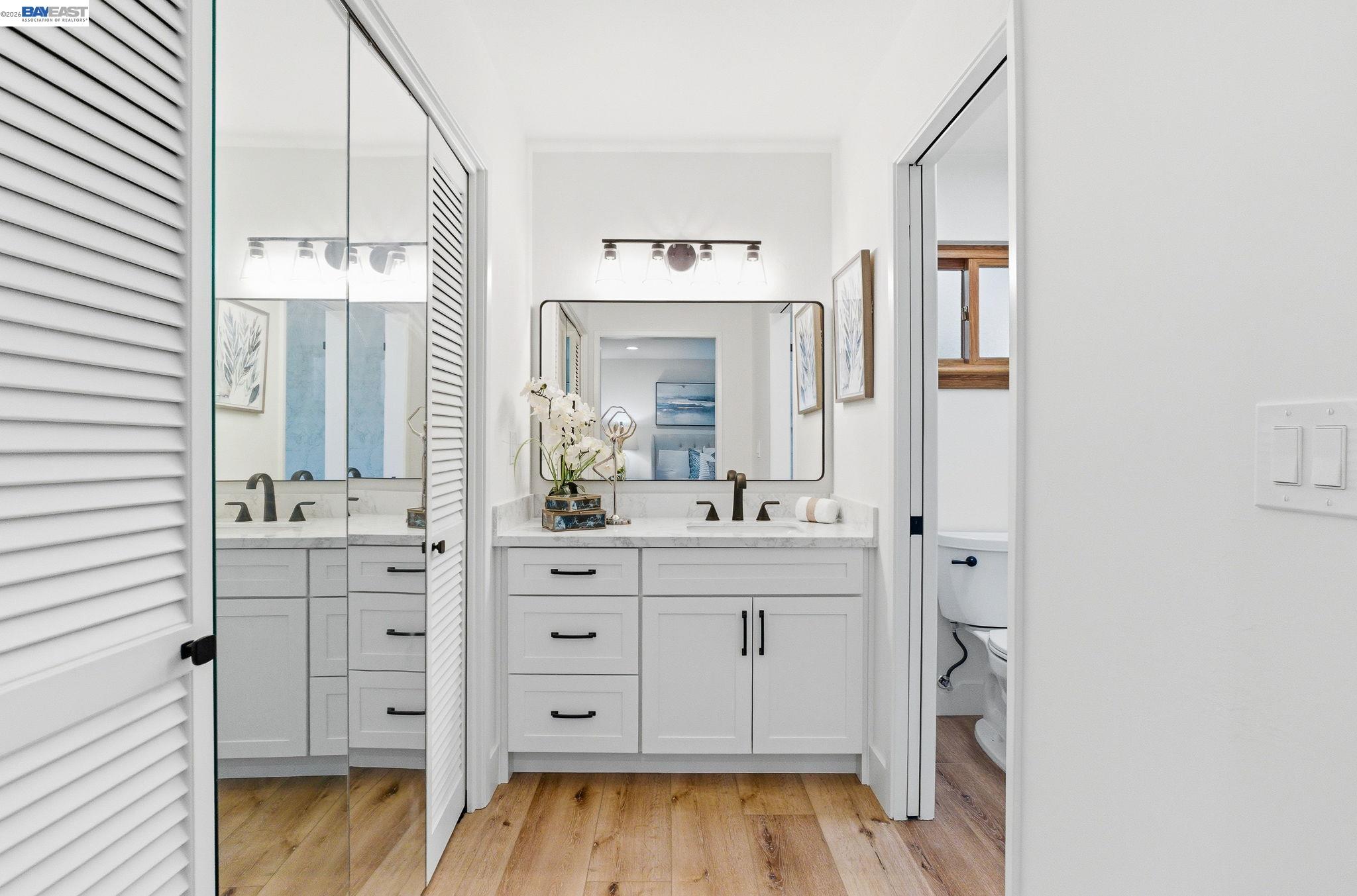 2645 Swanson Way Mountain View, CA 94040 - Photo 19 of 50 a bathroom with a double vanity sink mirror and