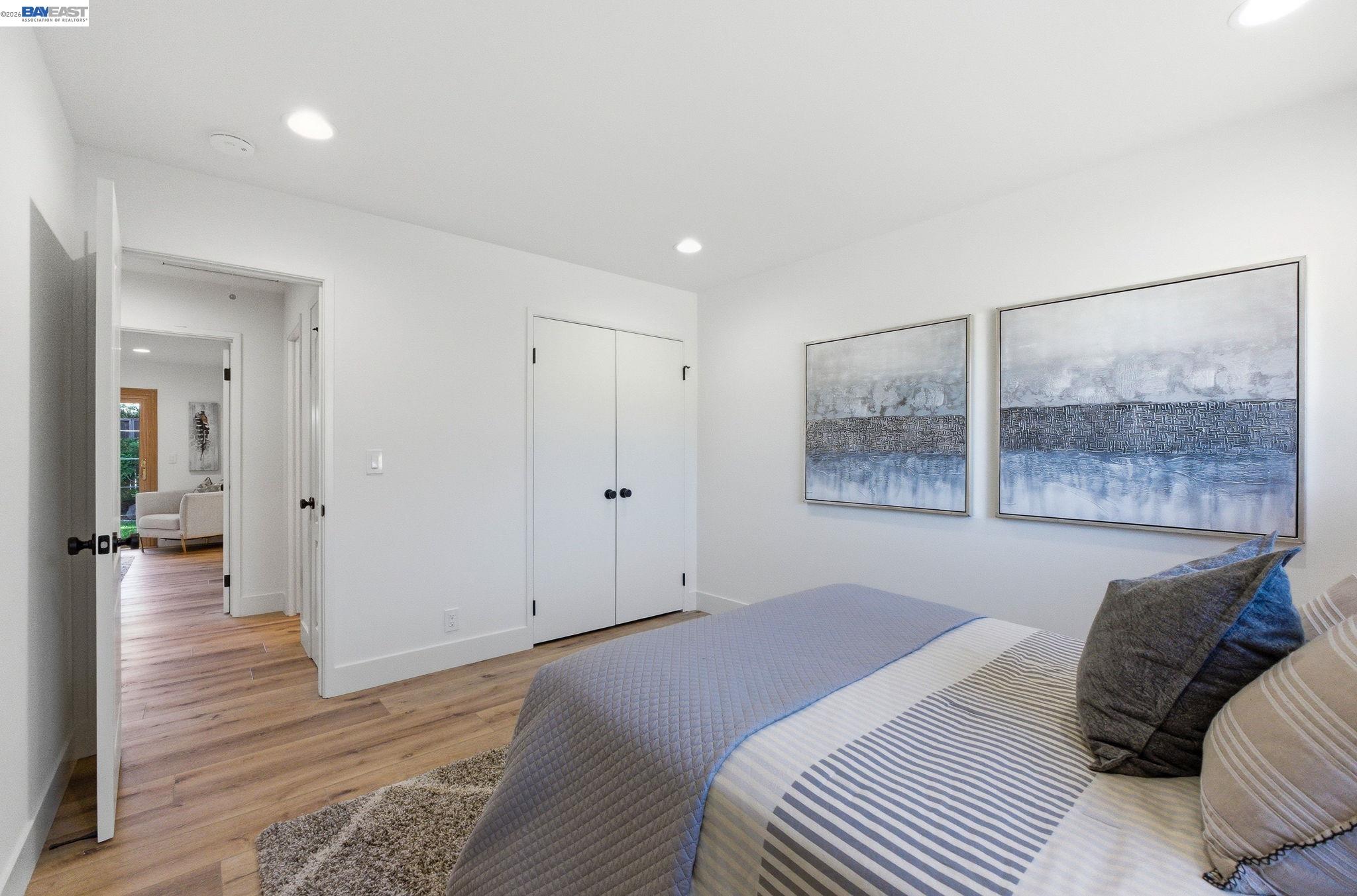 2645 Swanson Way Mountain View, CA 94040 - Photo 23 of 50 a bedroom with a bed and a large window