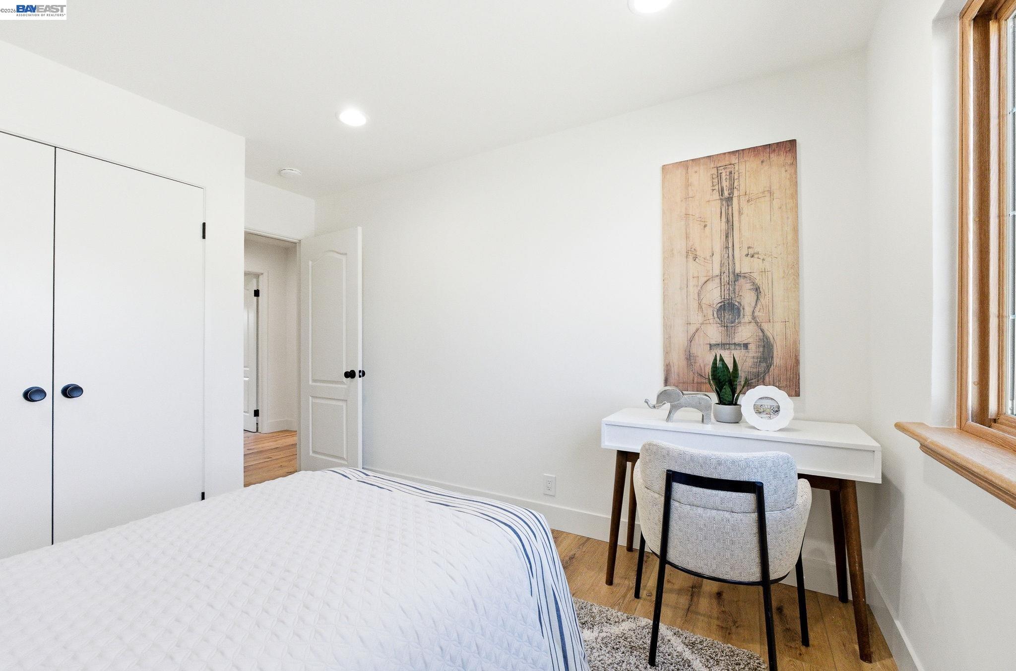 2645 Swanson Way Mountain View, CA 94040 - Photo 25 of 50 a bedroom with a bed and a table in it