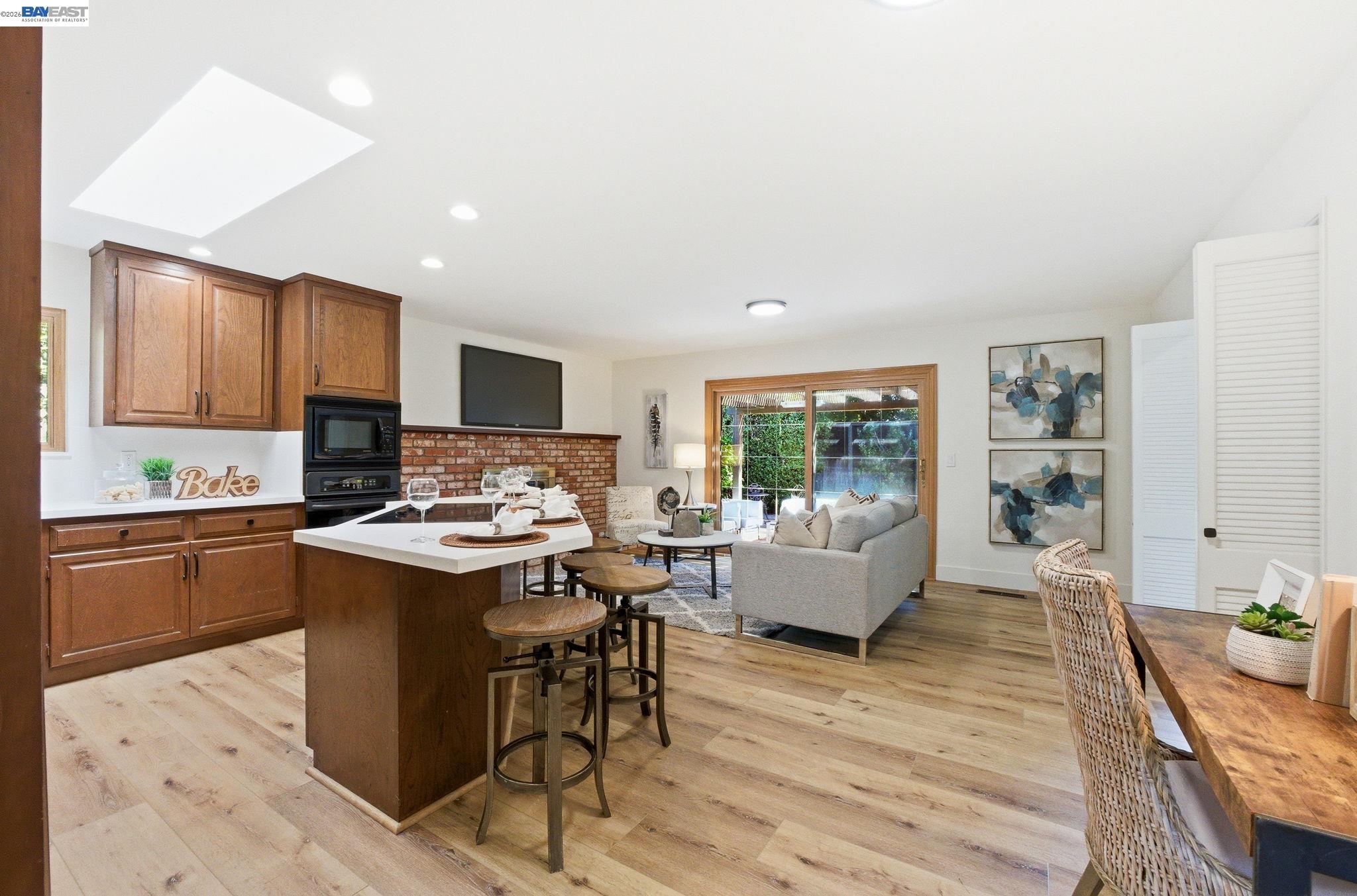 2645 Swanson Way Mountain View, CA 94040 - Photo 29 of 50 a living room with furniture and a wooden floor