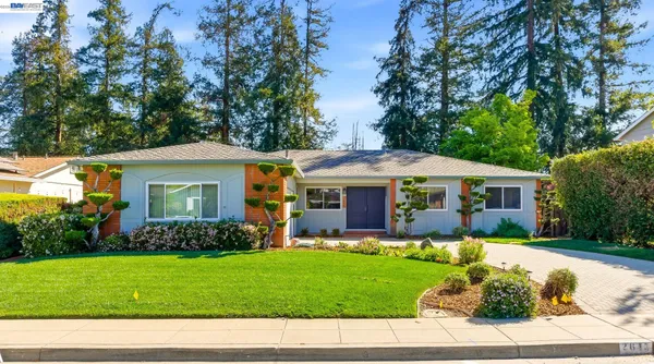 a house view with a garden space