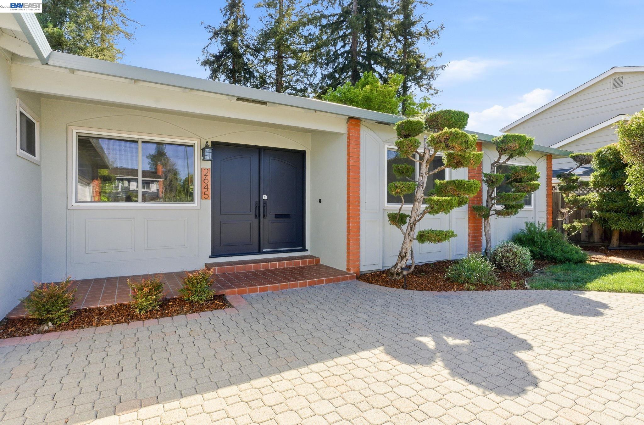2645 Swanson Way Mountain View, CA 94040 - Photo 4 of 50 a front view of a house with a garage