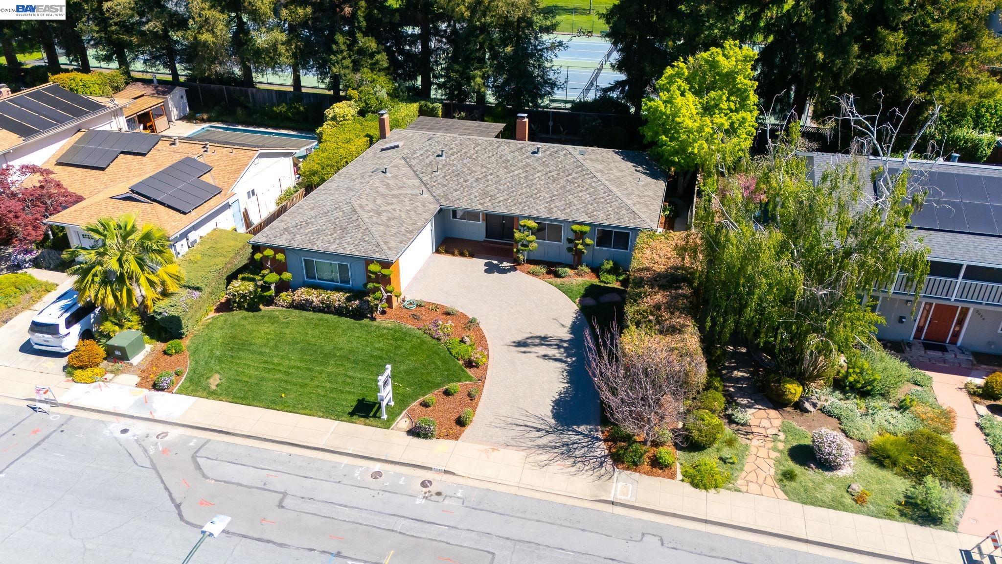 2645 Swanson Way Mountain View, CA 94040 - Photo 46 of 50 an aerial view of a house with a yard and trees