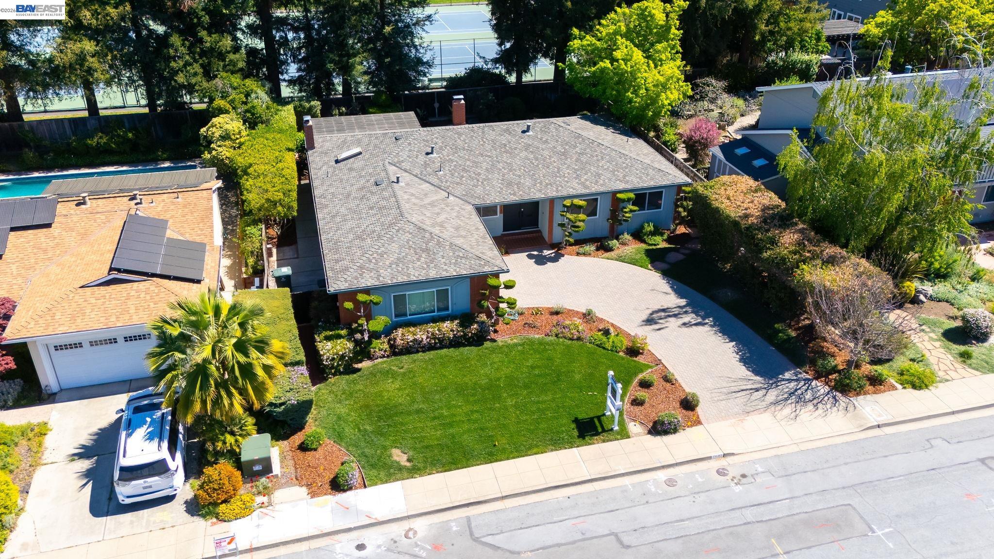 2645 Swanson Way Mountain View, CA 94040 - Photo 47 of 50 an aerial view of a house with swimming pool and large trees