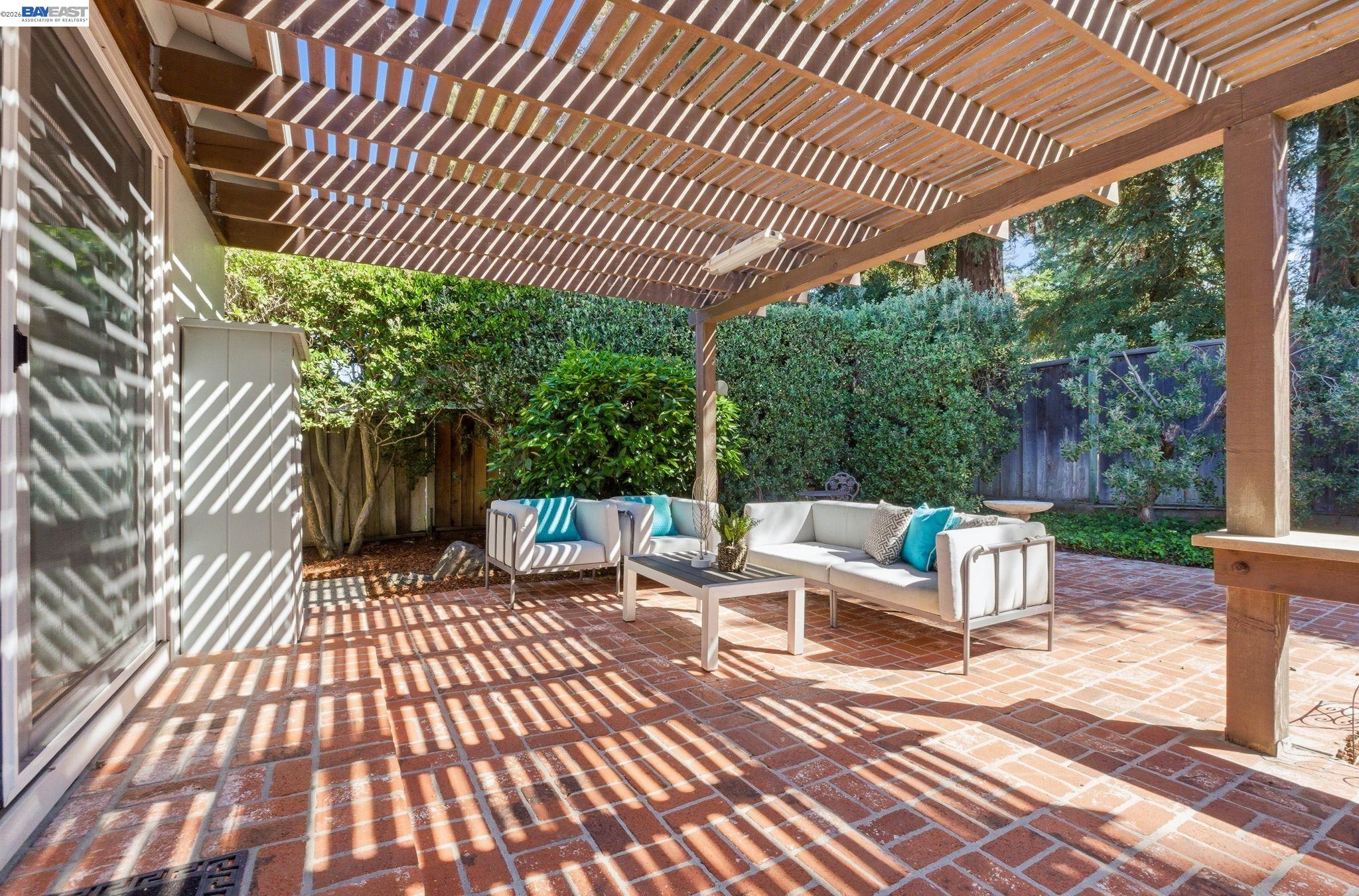 2645 Swanson Way Mountain View, CA 94040 - Photo 5 of 50 a view of a patio with table and chairs and wooden floor