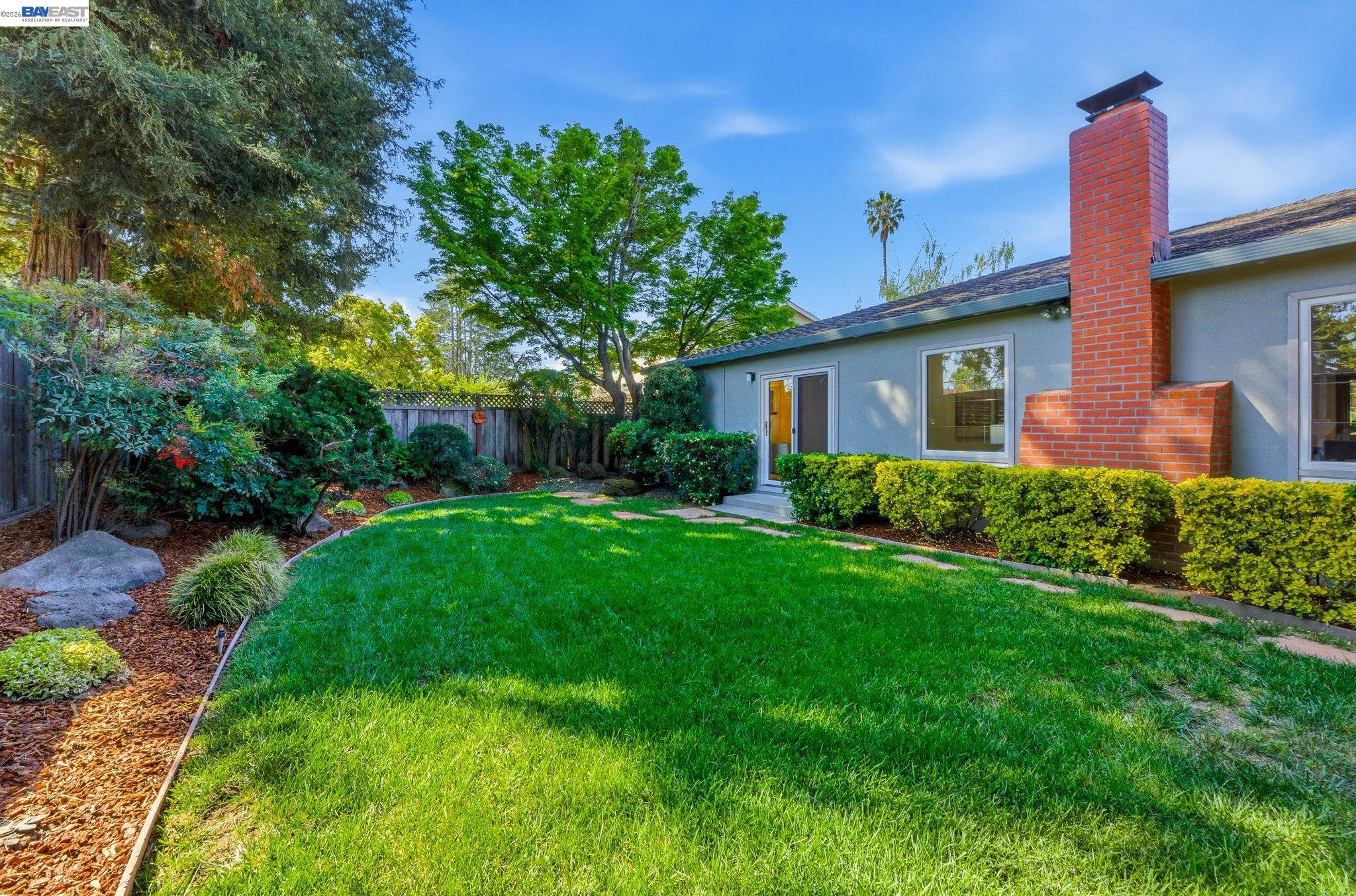 2645 Swanson Way Mountain View, CA 94040 - Photo 7 of 50 a view of a house with a yard and plants