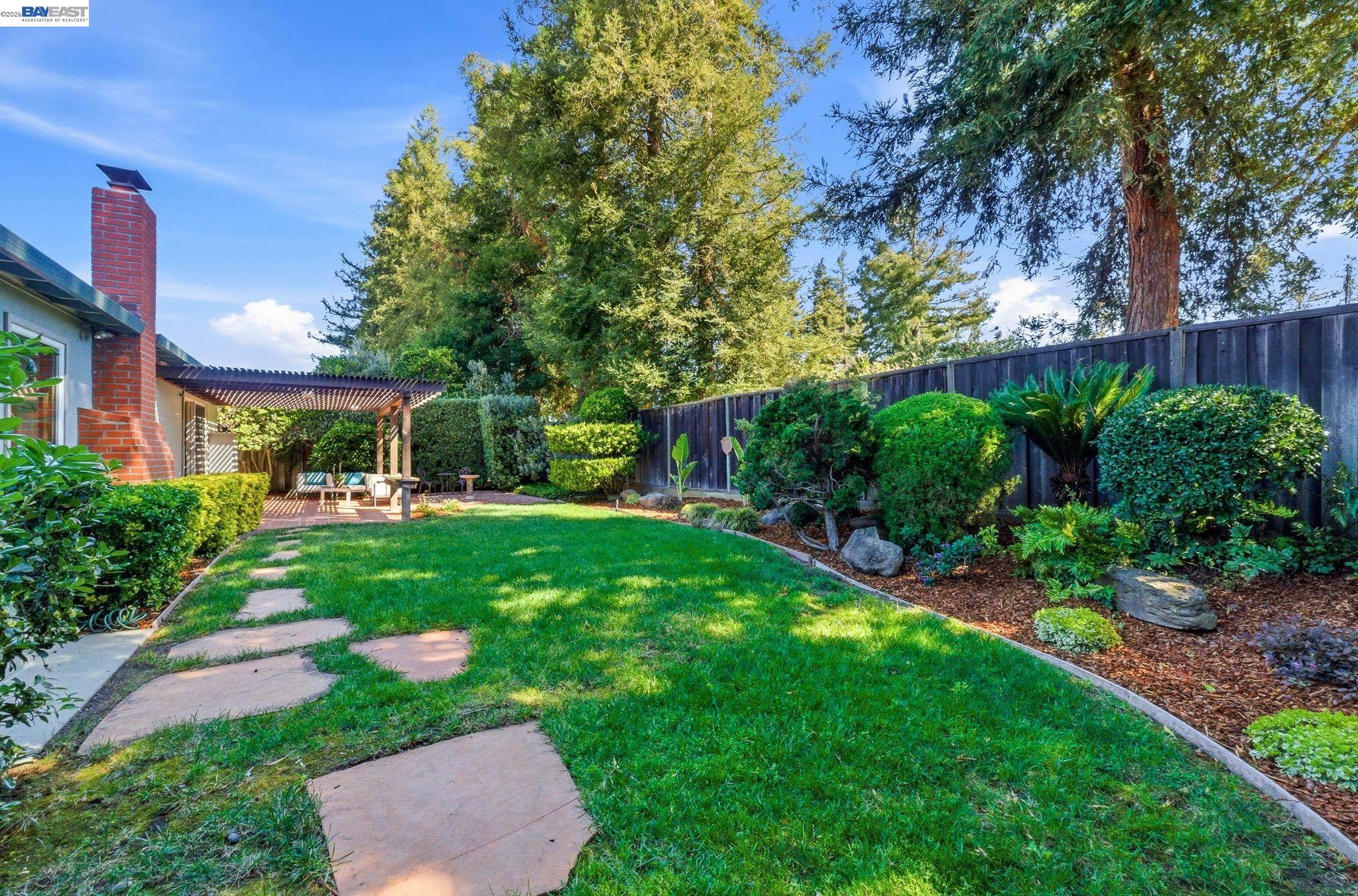 2645 Swanson Way Mountain View, CA 94040 - Photo 8 of 50 a view of yard in front of house with a big yard