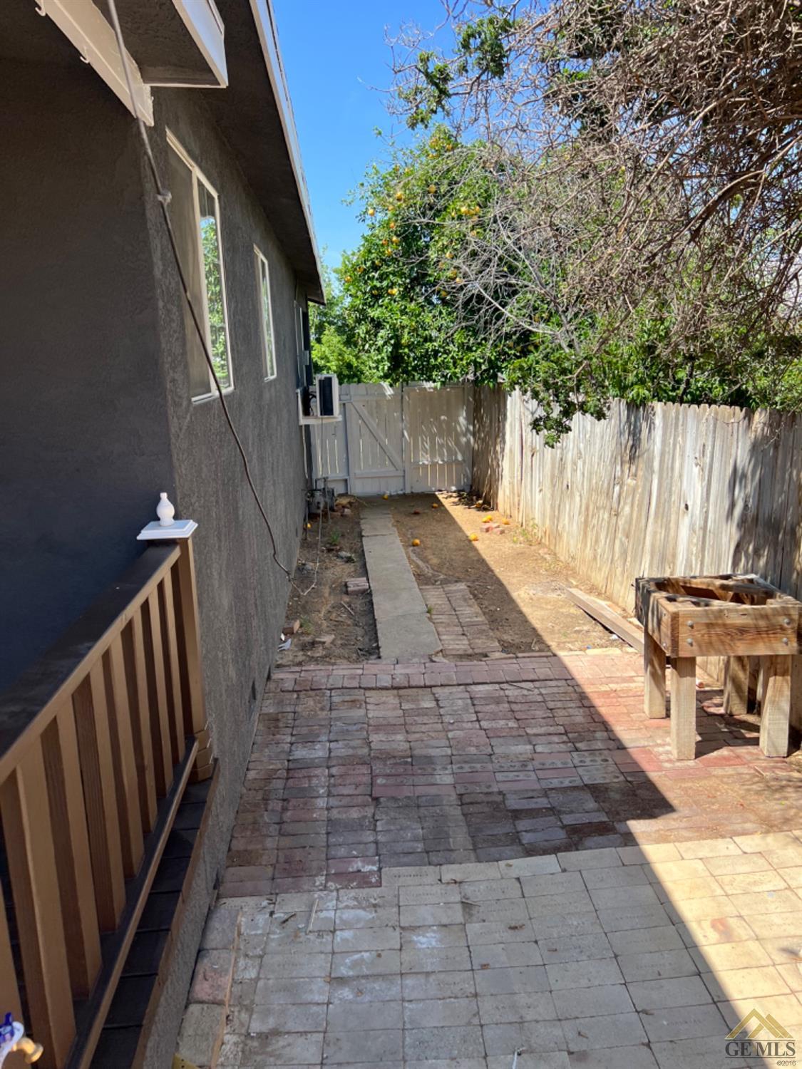 Undisclosed Address Taft, CA 93268 - Photo 11 of 21 a view of a backyard with pathway