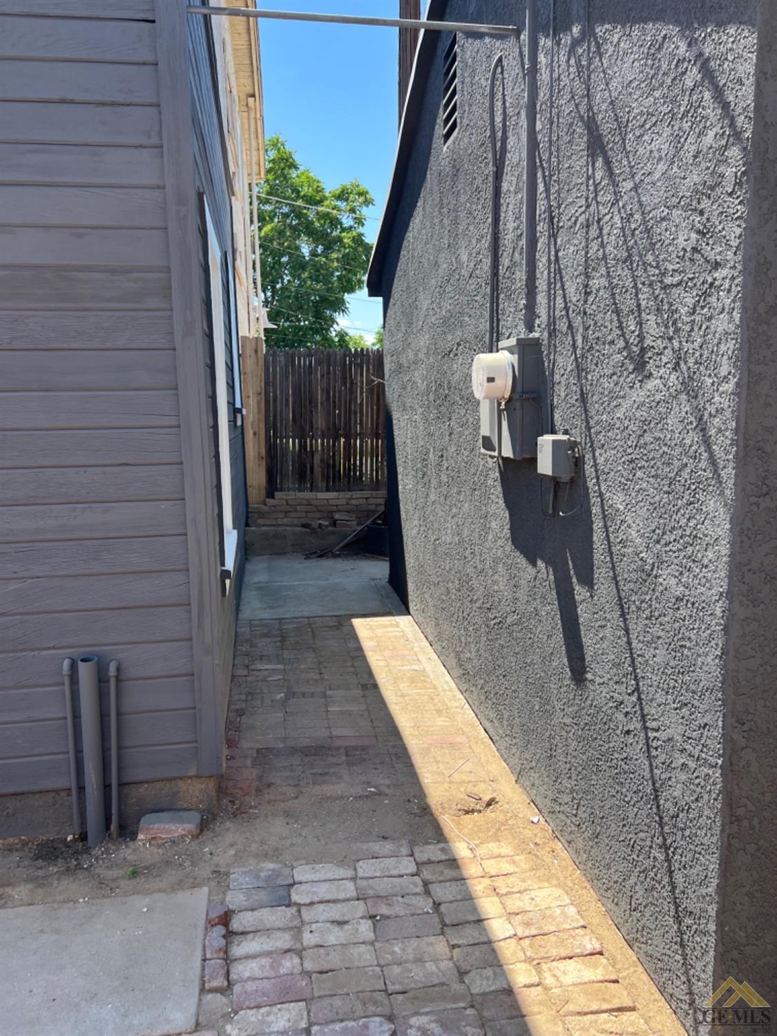 Undisclosed Address Taft, CA 93268 - Photo 15 of 21 a view of a pathway along with brick wall