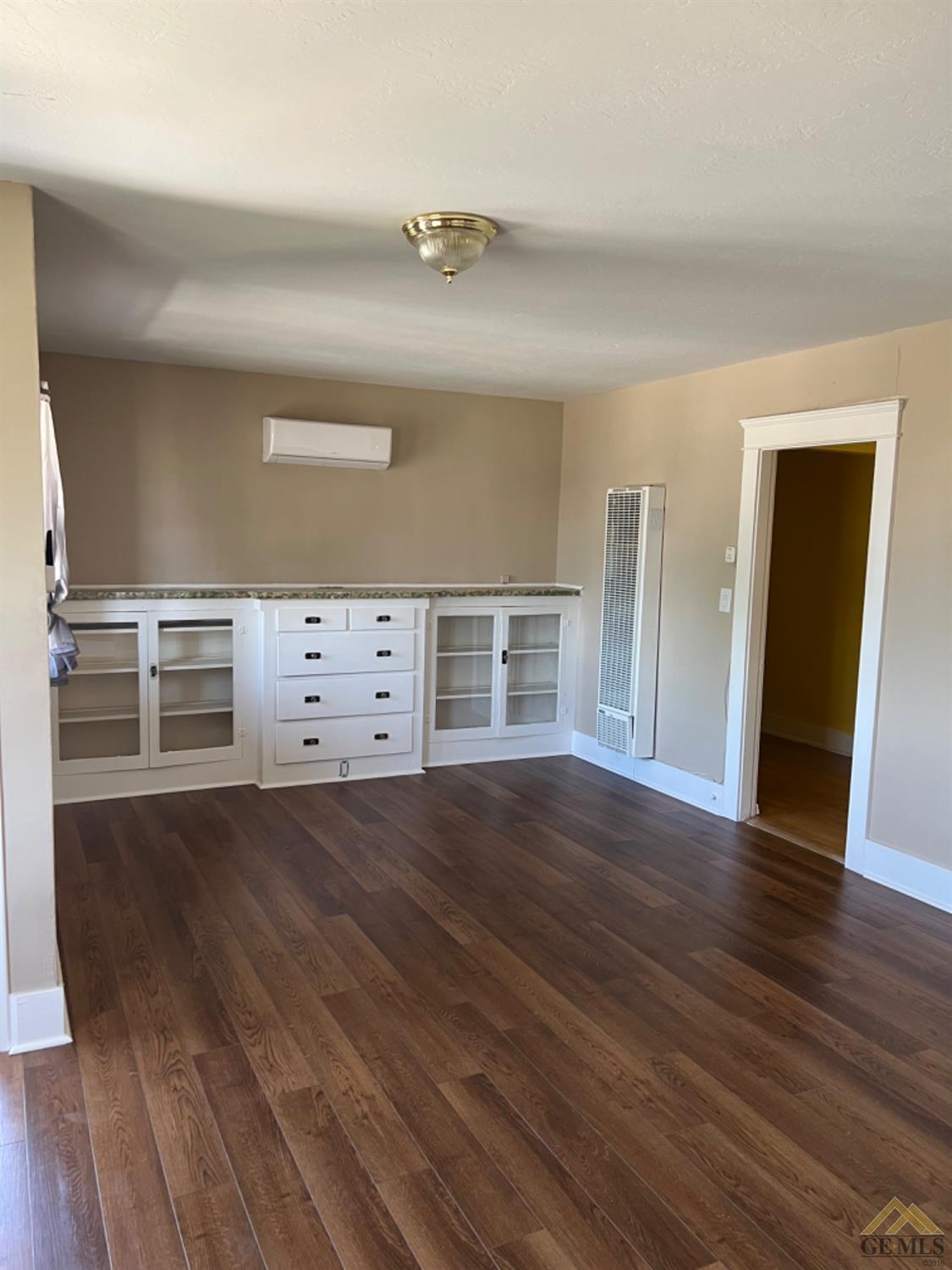 Undisclosed Address Taft, CA 93268 - Photo 3 of 21 a view of a livingroom with wooden floor