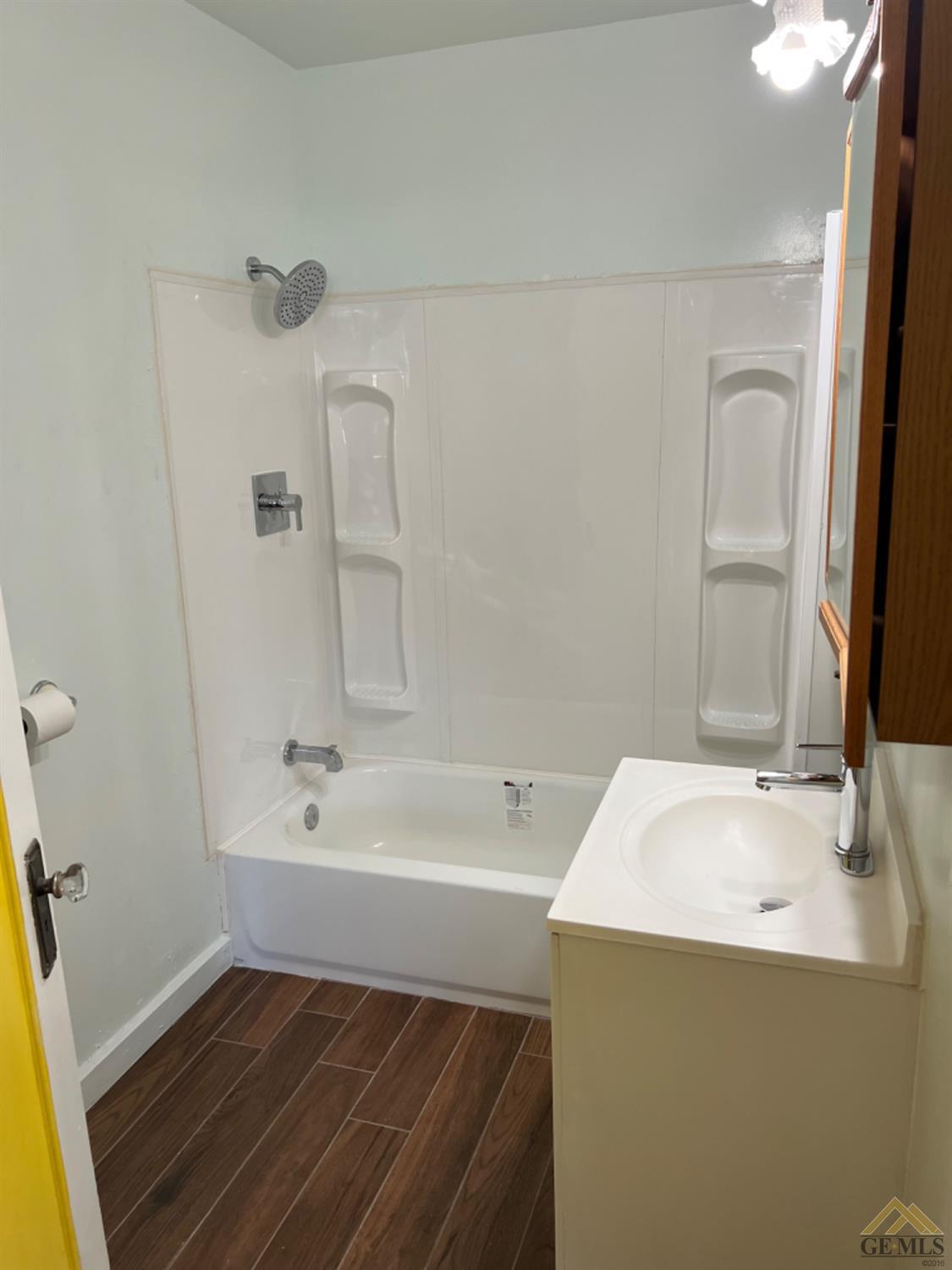 Undisclosed Address Taft, CA 93268 - Photo 8 of 21 a bathroom with a sink a bathtub and a mirror