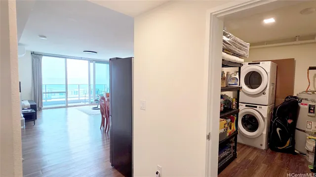 a view of livingroom with washer and dryer