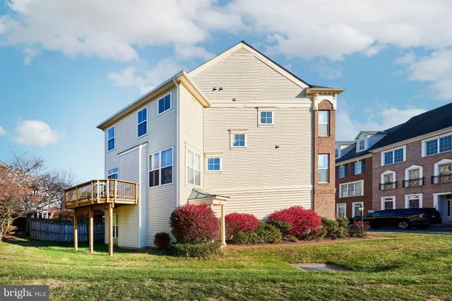 a front view of building with yard