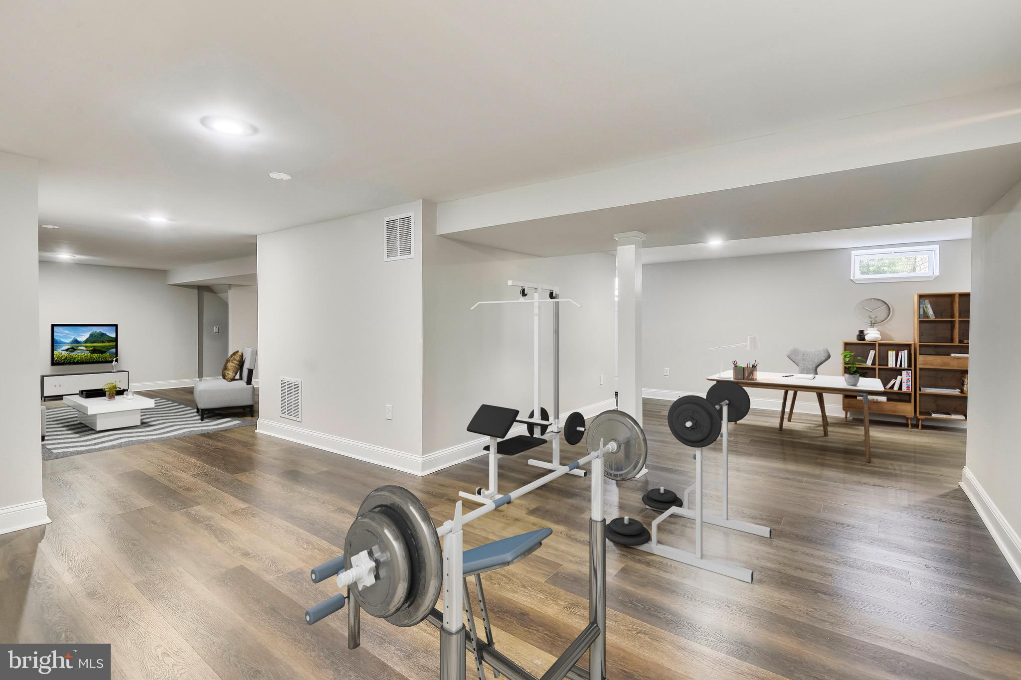 250 Asbury Road Pasadena, MD 21122 - Photo 19 of 36 Finished basement with work out area