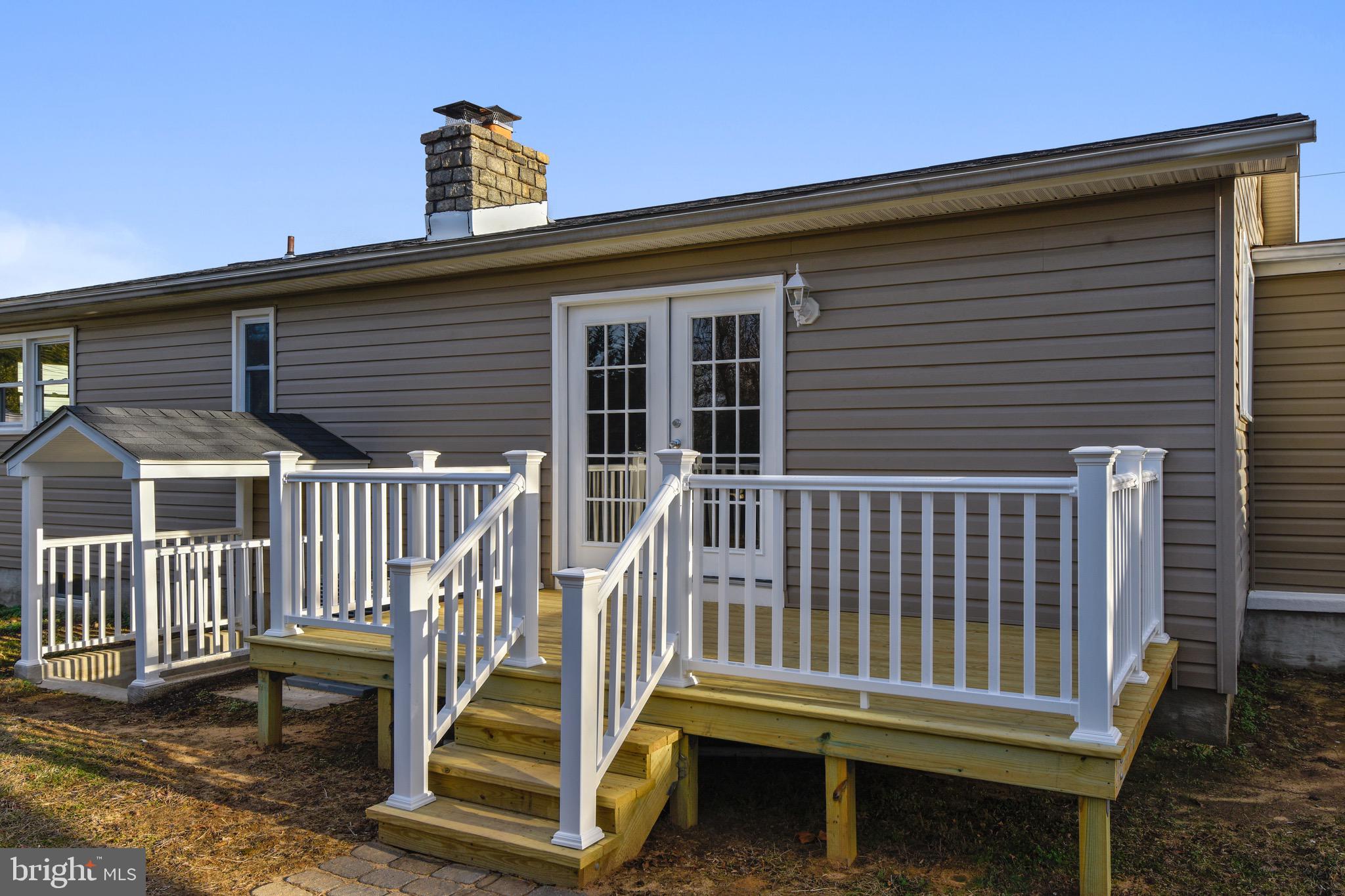 250 Asbury Road Pasadena, MD 21122 - Photo 25 of 36 Deck and covered basement walk up