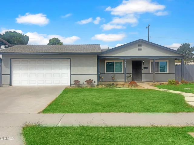 a front view of house with yard