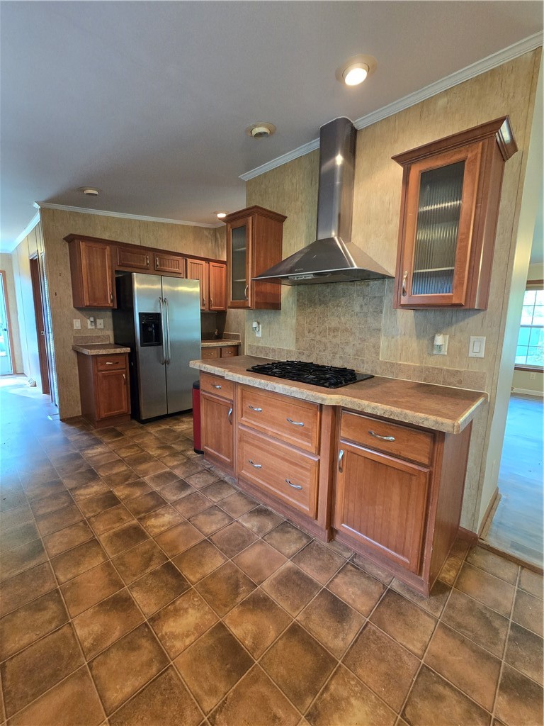 5337 State Rte 26 Triangle, NY 13862 - Photo 7 of 22 Warm wood cabinetry and textured floor tile bring classic character to this functional kitchen layout.