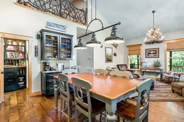 a white toilet sitting next to a white sink