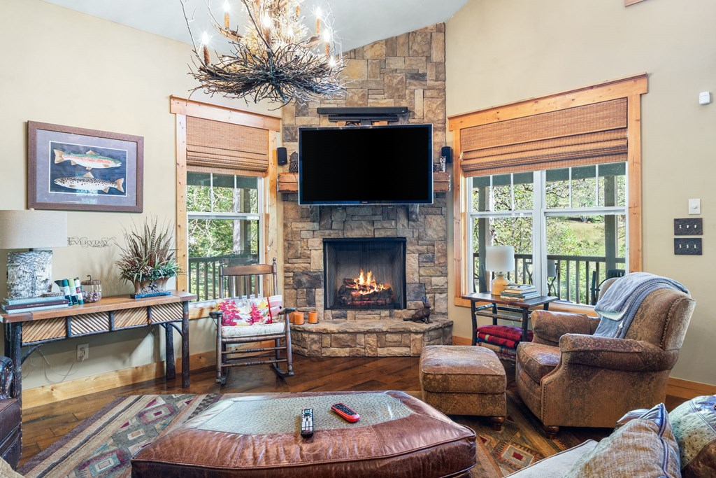 220 Haven Lane Murphy, NC 28906 - Photo 34 of 67 a living room with furniture fireplace and a flat screen tv