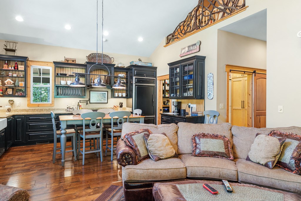 220 Haven Lane Murphy, NC 28906 - Photo 35 of 67 a living room with furniture kitchen view and a large window