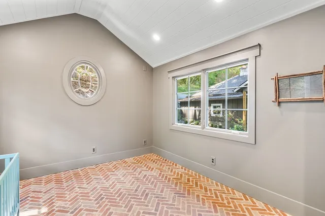 a view of a swimming pool with sitting area