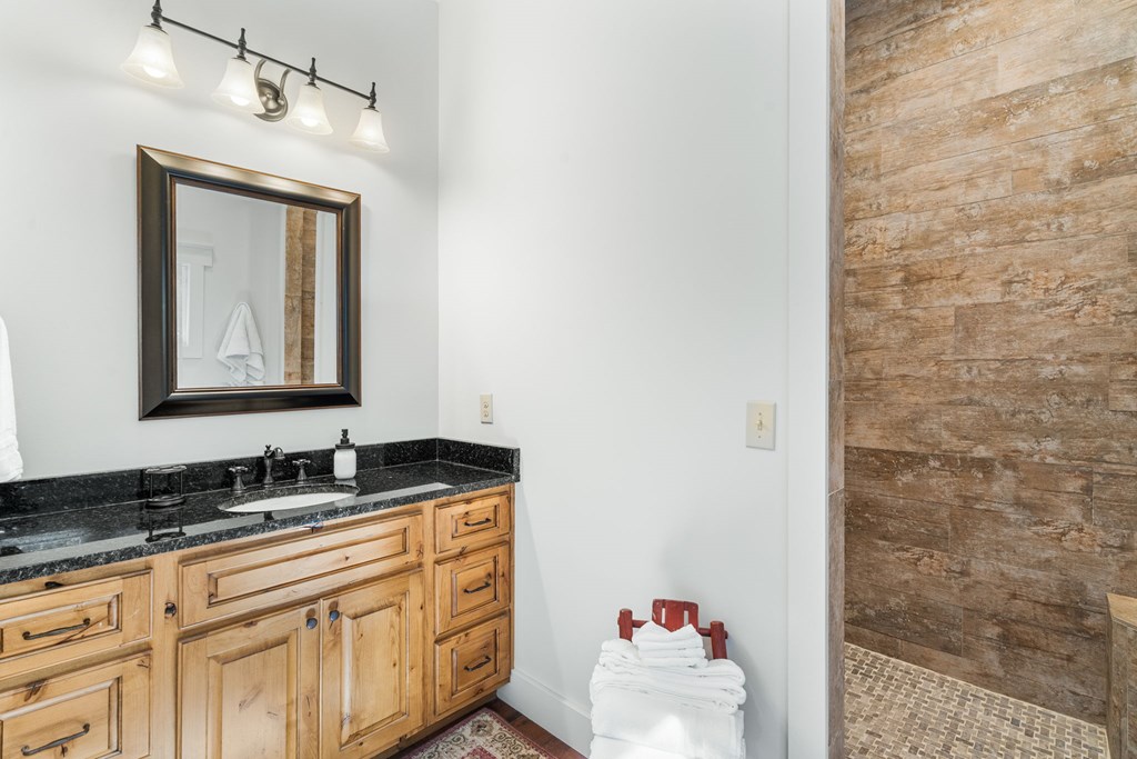 220 Haven Lane Murphy, NC 28906 - Photo 43 of 67 a bathroom with a sink and a mirror