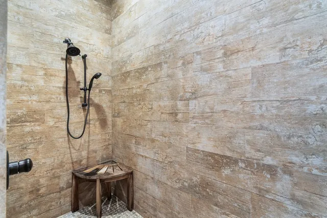 a view of a back yard of the house with a yard