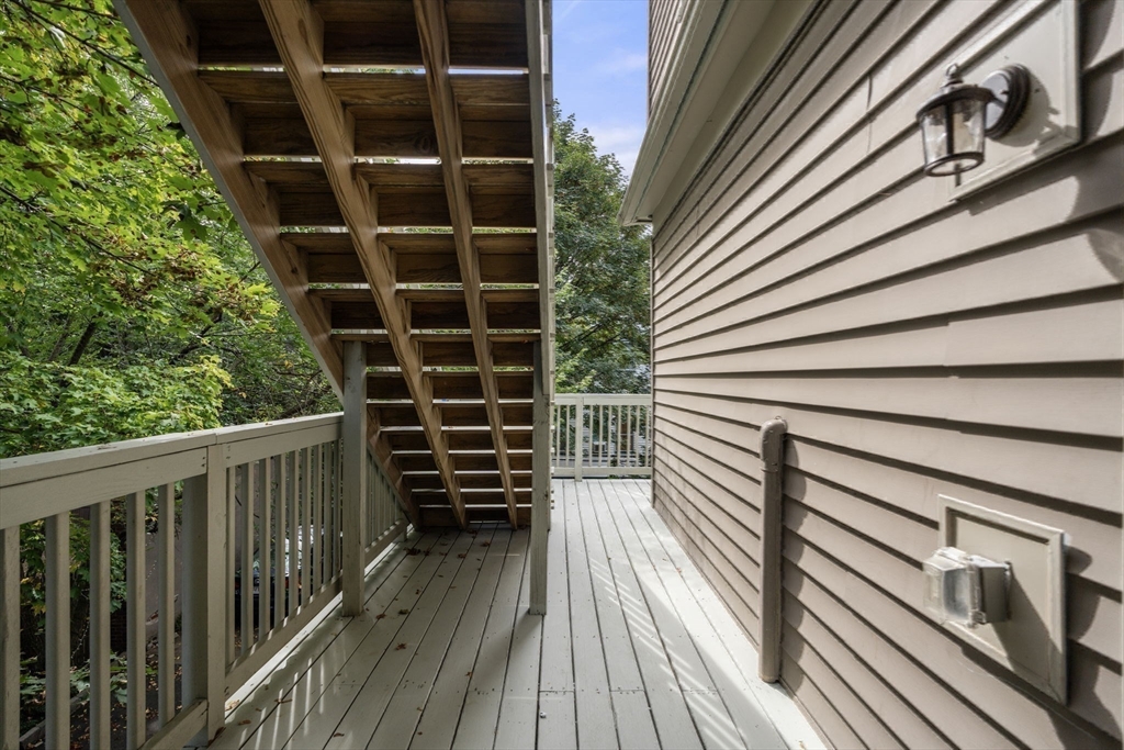 4 Wyoming Street, Unit 2 Boston, MA 02121 - Photo 20 of 23 a view of a balcony with wooden floor and city view